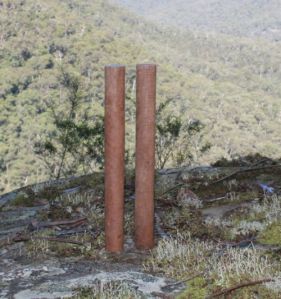 clap sticks over gully